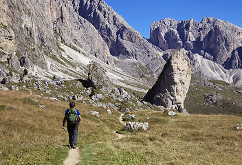 Image showing A tourist hiking in Val di Gardena in the Dolomites