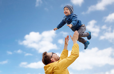 Image showing father with son playing and having fun outdoors