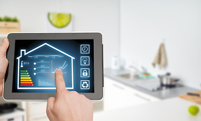 Image showing tablet pc with smart home settings on screen