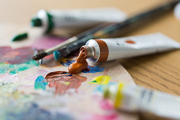 Image showing acrylic color or paint tubes and palette