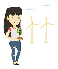 Image showing Woman holding small plant vector illustration.