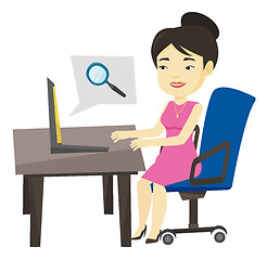 Image showing Business woman searching information on internet.