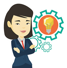 Image showing Woman with business idea bulb in gear.