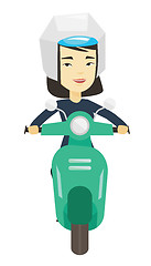 Image showing Woman riding scooter in the city.