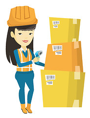 Image showing Warehouse worker scanning barcode on box.