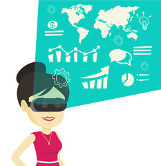 Image showing Businesswoman in vr headset analyzing virtual data