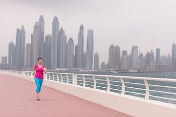 Image showing woman running on the promenade