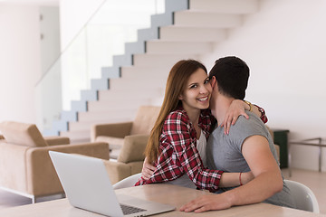 Image showing happy young couple buying online