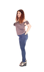Image showing Curvy woman standing in profile 