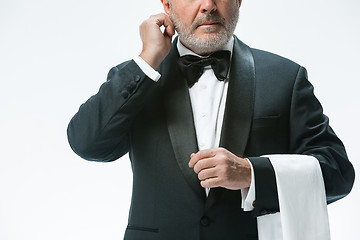 Image showing Senior waiter with white towel. Sign language in the restaurant