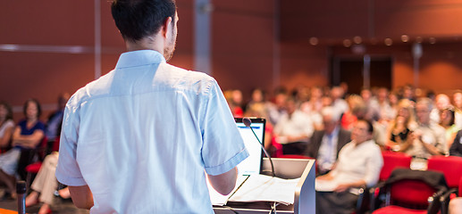 Image showing Public speaker giving talk at Business Event.