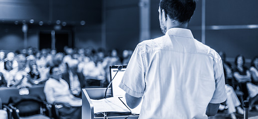 Image showing Public speaker giving talk at Business Event.