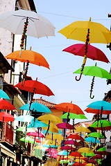 Image showing Street with Umbrellas