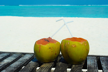 Image showing Tropical coconut on white beach