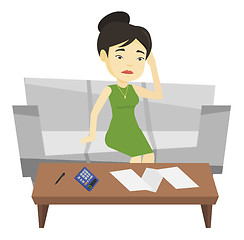 Image showing Unhappy asian woman accounting home bills.