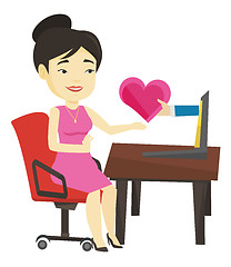 Image showing Young woman dating online using laptop.