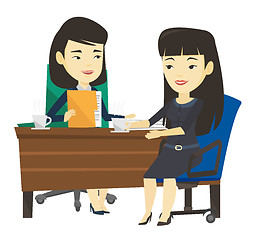 Image showing Two businesswomen during business meeting.