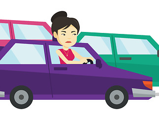 Image showing Angry asian woman in car stuck in traffic jam.