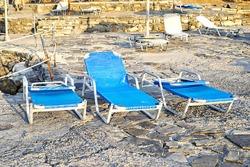 Image showing Deck chairs on a sandy beach