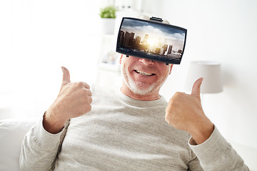 Image showing old man in virtual reality headset shows thumbs up