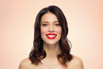 Image showing beautiful smiling young woman with red lipstick