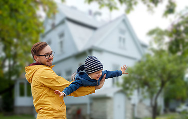 Image showing father with son playing and having fun outdoors