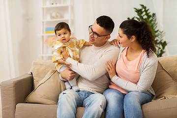 Image showing happy family with baby daughter at home