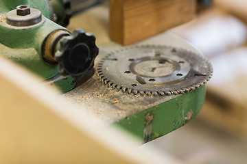 Image showing cogwheel of old machine at workshop