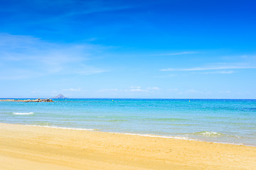 Image showing European sandy beach and blue sea.