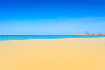 Image showing European sandy beach and blue sea.