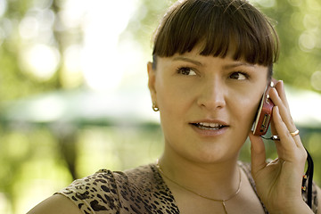 Image showing beautiful woman calling by phone