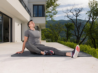 Image showing man doing morning yoga exercises