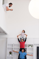 Image showing young boys posing line up piggyback