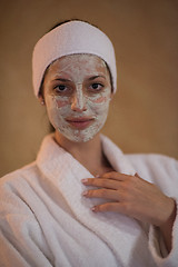 Image showing Spa Woman applying Facial Mask