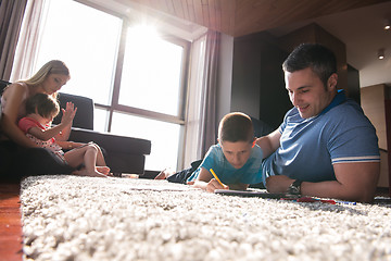 Image showing young couple spending time with kids