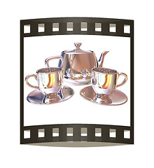 Image showing Chrome Teapot and mugs. 3d illustration. The film strip.