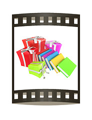 Image showing Gifts and books. 3d illustration. The film strip.