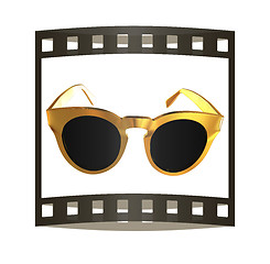 Image showing Cool gold sunglasses. 3d illustration. The film strip.