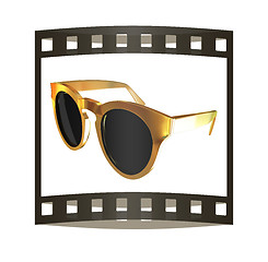 Image showing Cool gold sunglasses. 3d illustration. The film strip.