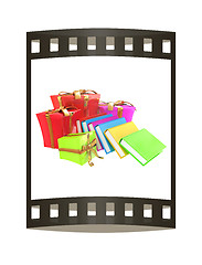 Image showing Gifts and books. 3d illustration. The film strip.