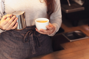 Image showing Barista, cafe, making coffee, preparation and service concept