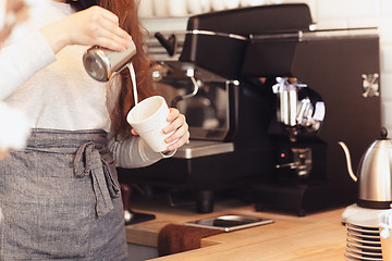 Image showing Barista, cafe, making coffee, preparation and service concept