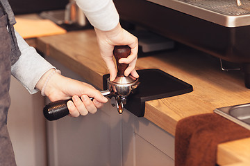 Image showing Barista, cafe, making coffee, preparation and service concept