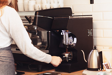 Image showing Barista, cafe, making coffee, preparation and service concept