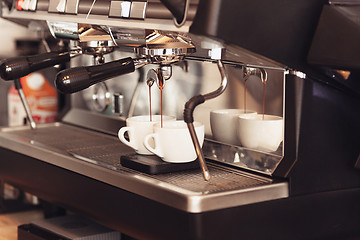 Image showing Barista, cafe, making coffee, preparation and service concept