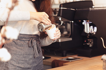 Image showing Barista, cafe, making coffee, preparation and service concept