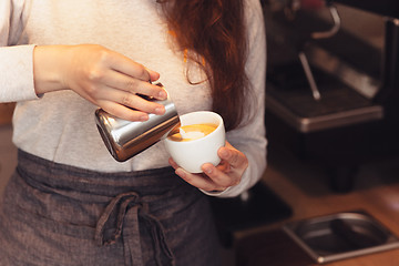 Image showing Barista, cafe, making coffee, preparation and service concept