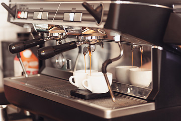 Image showing Barista, cafe, making coffee, preparation and service concept