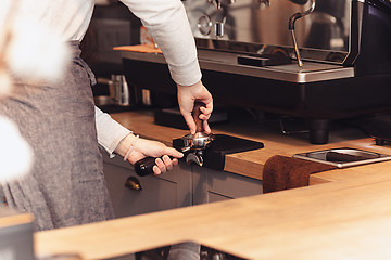 Image showing Barista, cafe, making coffee, preparation and service concept