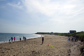 Image showing editorial girl flying kite Ditch Plains Beach Montauk New York